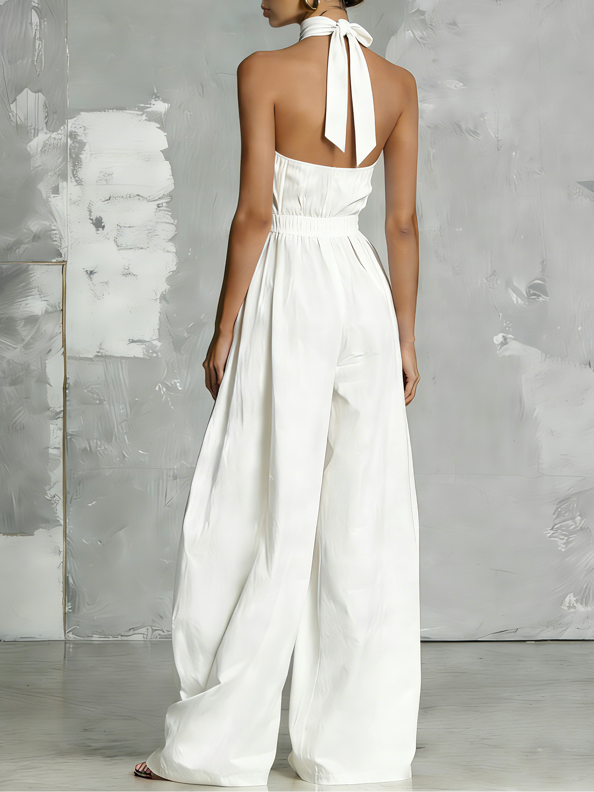 Zoltán | Elegant white woven sleeveless halter-neck jumpsuit